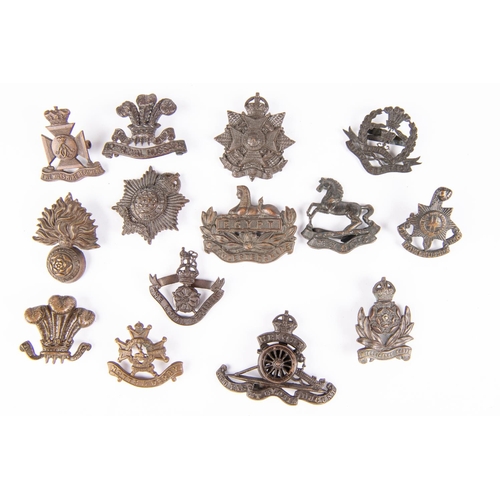 197 - Nine officers' bronze cap badges with prongs: post 1926 King's, Gloucestershire, Border, Hampshire b... 