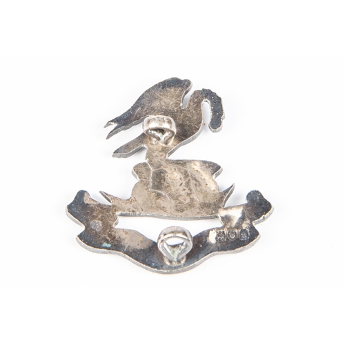 203 - A silver cap badge of the Liverpool Pals, HM London 1914, with maker's mark 