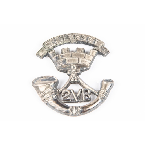 204 - An officer's cap badge of the 2nd Vol Bn, Somerset LI, GC (prongs missing). Appears to be unmarked s... 