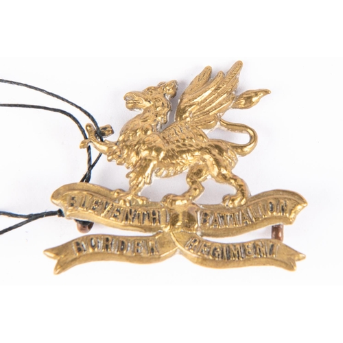 207 - A WWI brass cap badge of the 11th (Lonsdale) Bn The Border Regt, with Gaunt, London plate. (KK 1149)... 