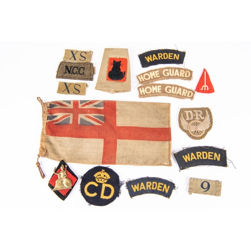 222 - WWII cloth badges: 5 Home Guard items, 4 Air Raid Wardens titles, NCC slip on and 6 other items. GC ... 