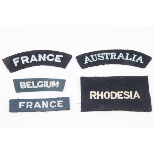 266 - A selection of WWII Nationality titles: Australia, Belgium, Rhodesia, France straight, France curved... 