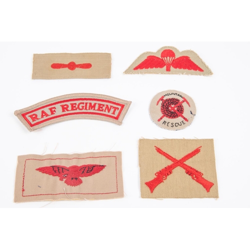 283 - A selection of RAF Tropical insignia including titles, eagles, trade badges, some WWII inc Parachute... 