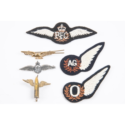 312 - RAF sweetheart brooch in silver, RAF brass badge, 3 cloth wings and AG brass badge, latter copies (6... 