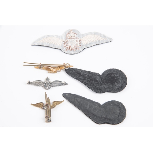 312 - RAF sweetheart brooch in silver, RAF brass badge, 3 cloth wings and AG brass badge, latter copies (6... 