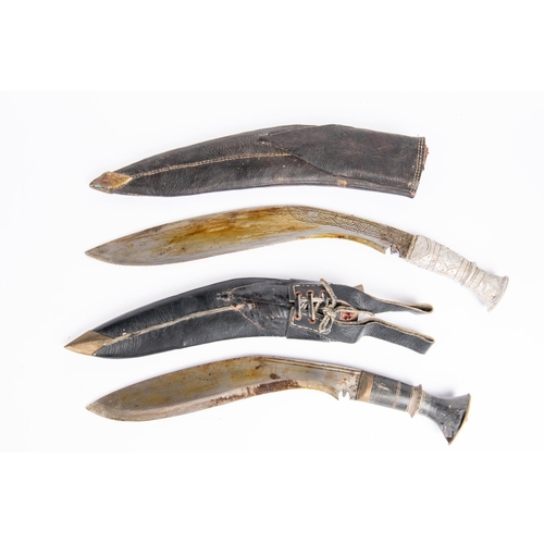 333 - A Gurkha kukri, with horn hilt and black leather sheath, also skinning knives; another similar with ... 