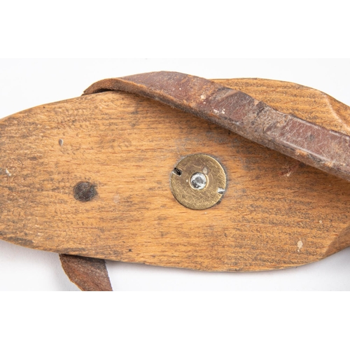 44 - A pair of vintage ice skates, wooden bodies with steel blades marked 