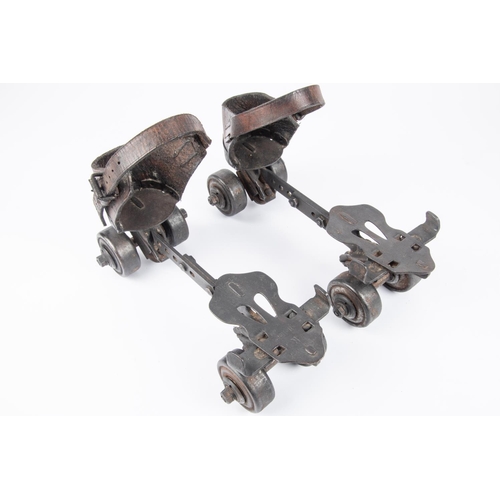 48 - A pair of vintage roller skates, steel bodies marked 