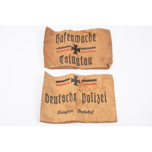 91 - 2 Imperial German armbands both printed on brown linen; Deutsche Polizei Tsingtau Bahnhof, and Hafen... 