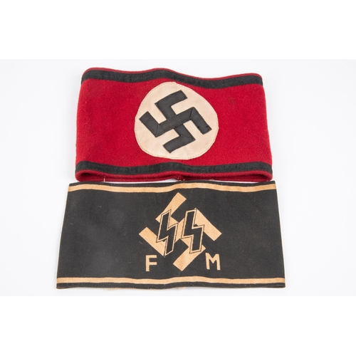 92 - A Third Reich party armband, with applique design and braided edging; also a printed black SS arm ba... 