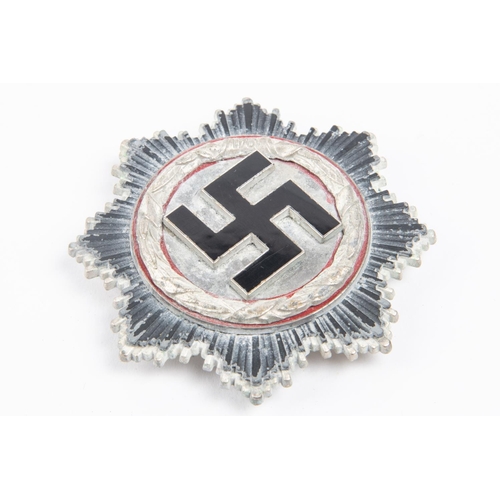 96 - A Third Reich German Cross in silver, marked 