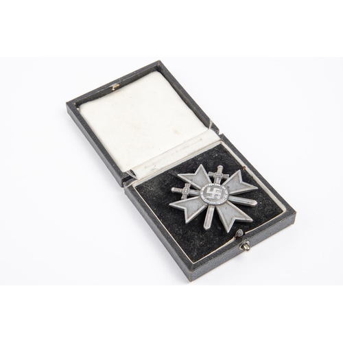 97 - A Third Reich War Service Cross, 1st class with swords, silvered finish, in its case of issue. GC £5... 