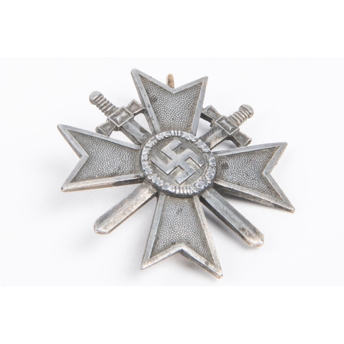 97 - A Third Reich War Service Cross, 1st class with swords, silvered finish, in its case of issue. GC £5... 