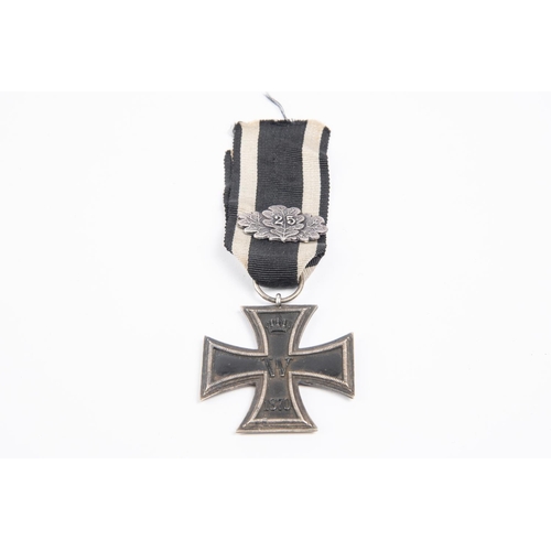 97 - A Third Reich War Service Cross, 1st class with swords, silvered finish, in its case of issue. GC £5... 