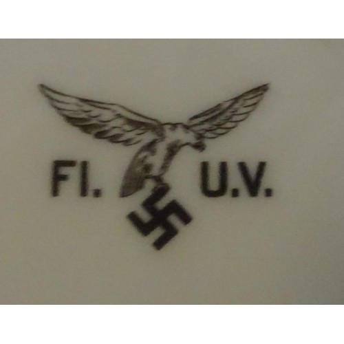 79 - A Third Reich pottery meat platter, marked with Luftwaffe eagle and 