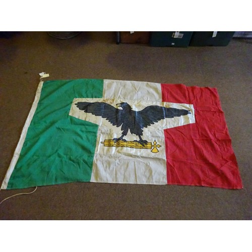 144 - A WWII Italian stitched flag, 150cm x 85cm, with applied printed panel of eagle, etc. GC  £65-75