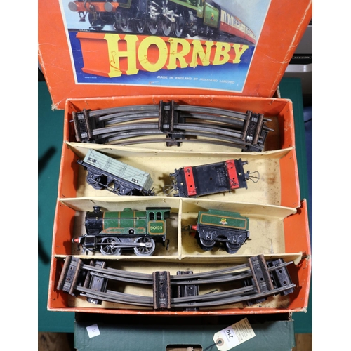 210 - 26x Hornby O gauge railway items. Including 2x train sets; an M3 Tank Goods set comprising LMS 0-4-0... 