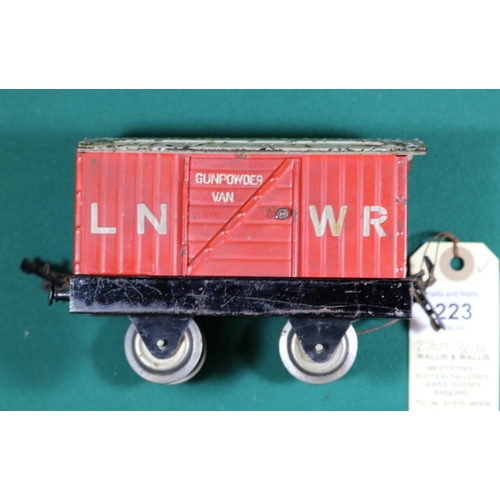 223 - A Hornby Series O gauge LNWR Gunpowder Van. In red with first type chassis and early style couplings... 