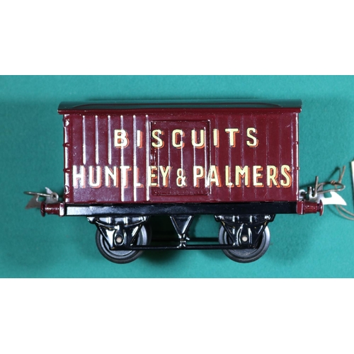 224 - A Hornby Series O gauge Huntley & Palmers Biscuits van in maroon with plastic wheels. VGC, very mino... 