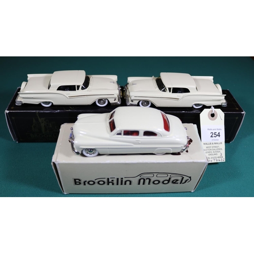 254 - 3 Brooklin. 2x 1957 Ford Fairlane Skyliner BRK35. Both in cream with black interior, with plated whe... 