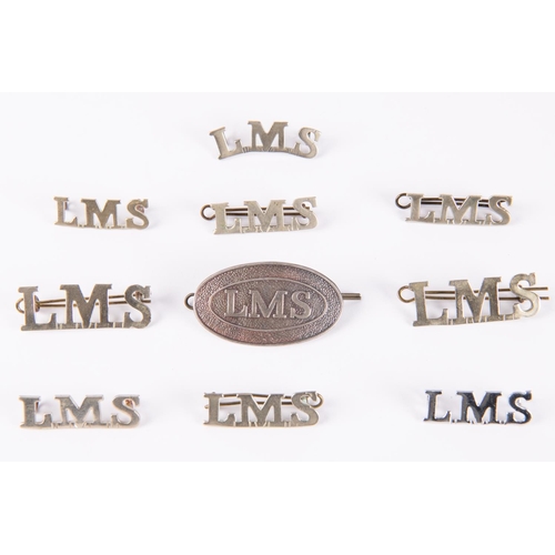 12 - 10x LMS Railway chrome shoulder/collar titles and cap badges. GC-VGC. £40-60