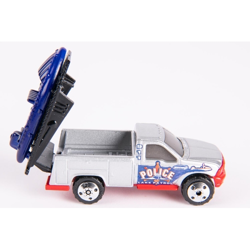 336 - Matchbox Ford utility truck (police). Hand painted and hand decorated, glued base. From Tyco Matchbo... 