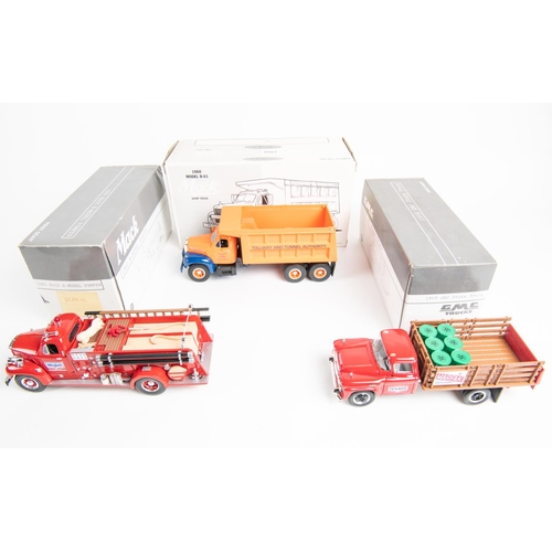 390 - 10 First Gear 1:34 scale Trucks. 1960 Model B-61 Mack Dump Truck, Tollway Tunnel. 1960 Model B-61 Ma... 