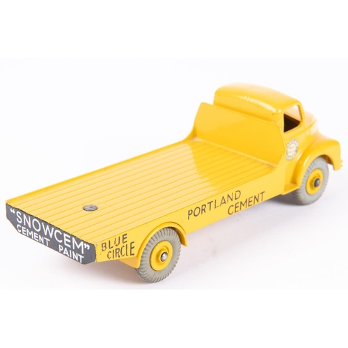 580 - A Dinky Toys Leyland Cament Wagon (533). In yellow with yellow wheels and grey tyres. Boxed, minor w... 