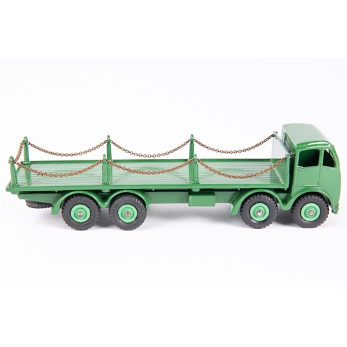 584 - Dinky Toys Foden Flat Truck with chains (905). FG Foden in green with green Supertoys wheels. Boxed,... 