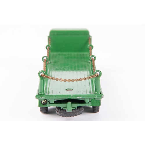 584 - Dinky Toys Foden Flat Truck with chains (905). FG Foden in green with green Supertoys wheels. Boxed,... 