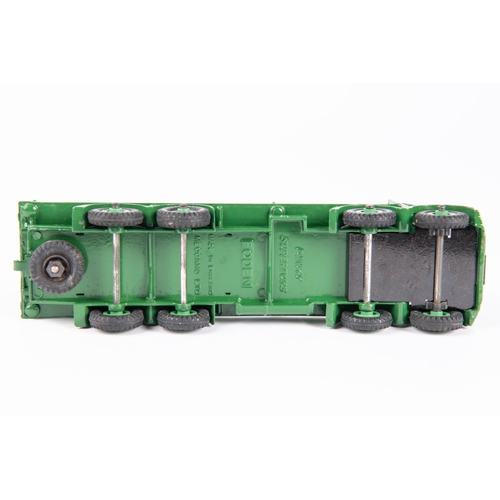 584 - Dinky Toys Foden Flat Truck with chains (905). FG Foden in green with green Supertoys wheels. Boxed,... 