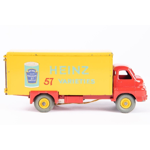 589 - Dinky Supertoys Big Bedford Heinz van (923). In red and yellow Heinz livery with Supertoys wheels an... 