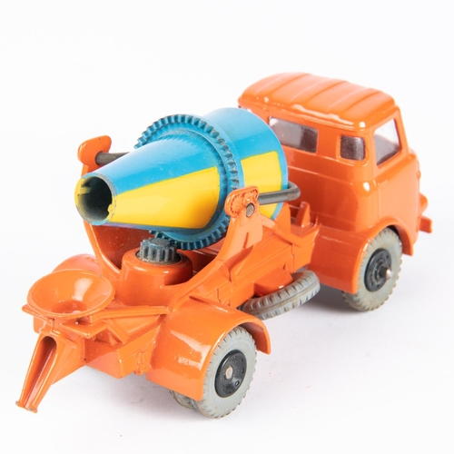 593 - A Dinky Toys Lorry Mounted Cement Mixer (960). An Albion in orange with blue and yellow rotating mix... 