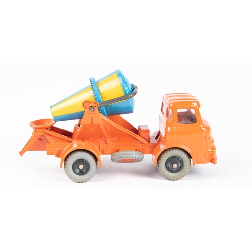 593 - A Dinky Toys Lorry Mounted Cement Mixer (960). An Albion in orange with blue and yellow rotating mix... 