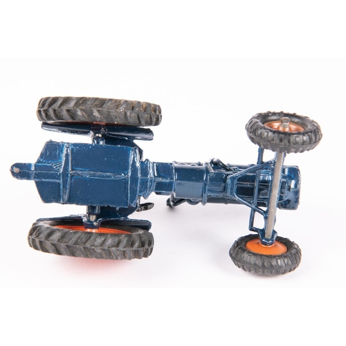 615 - A Britains Fordson Major Tractor with driver (128F) from the Model Home Farm Series. In dark blue wi... 