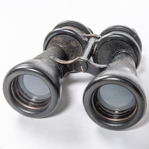 130 - A pair of Third Reich naval binoculars, in their black leather case with faint eagle and swastika ma... 