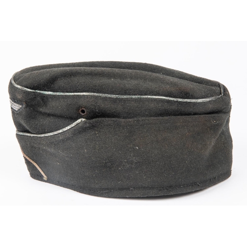 133 - A Third Reich NCO's Panzer side cap, marked inside KDR.Pz. R.G.T. 36, dated 18-1-41. GC  £150-200