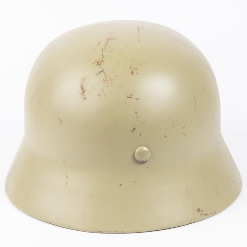 139 - A Third Reich M36 steel helmet, no decals, light grey/green finish, lining possibly post war. VGC £1... 