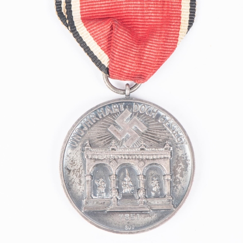 172 - A Third Reich Blood Order, silver medal with ribbon, near VGC. £1,250-1300.