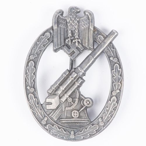 182 - A Third Reich anti aircraft gunner's badge, grey cast metal finish, in its case of issue, near VGC £... 