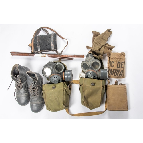 210 - 2 light pattern respirators in their WWII bags; a pair of ammunition boots; a St John Ambulance Brig... 