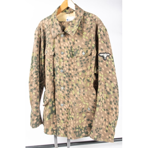 213 - A  good quality replica of a Third Reich Autumn pattern camouflage suit comprising smock and trouser... 