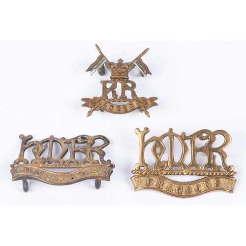 280 - A Victorian cap/collar badge of Her Majesty's Reserve Regiment of Lancers, and two collar badges of ... 