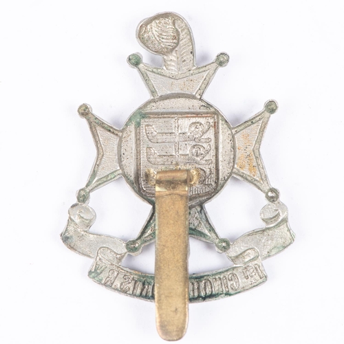 311 - A WM cap badge of the Cinque Ports Rifle Volunteers, with correct low mounted short slider. GC £50-6... 