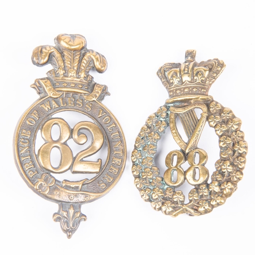 334 - Pre 1881 brass glengarry badges of the 82nd and 88th Regiment of Foot (K&K 551 and 559), GC £60-80