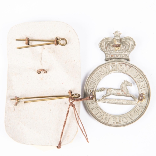 339 - A Victorian WM glengarry badge of the 2nd Vol Bn the West Yorkshire Regiment; and a two piece WM gle... 