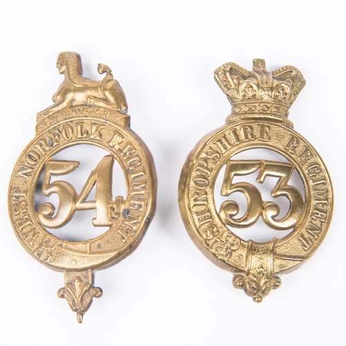 327 - Pre 1881 brass glengarry badges of the 53rd and 54th Regiments of Foot (K&K 512 and 513). GC £50-80