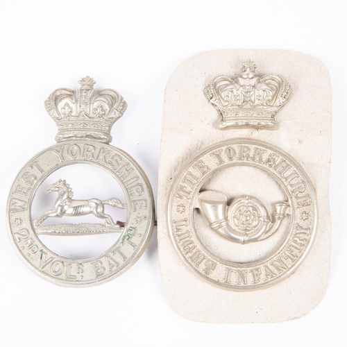 339 - A Victorian WM glengarry badge of the 2nd Vol Bn the West Yorkshire Regiment; and a two piece WM gle... 