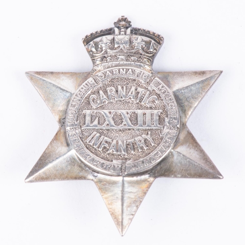 353 - An Indian unmarked silver badge of the 73rd Carnatic Infantry, with Victorian Imperial Crown, 35x37m... 