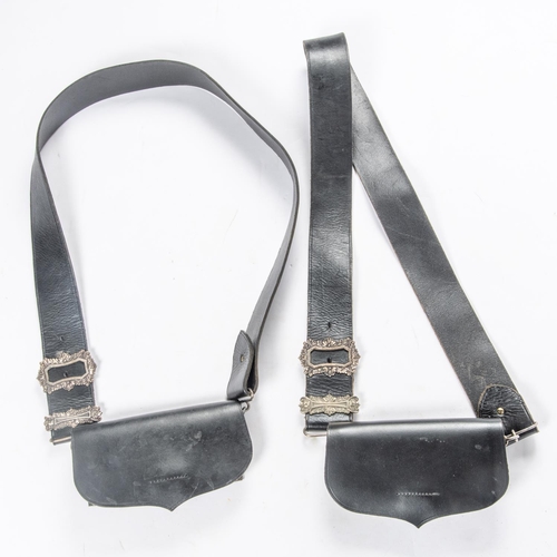 430 - 2 Volunteer shoulder belts, black leather with foliate embossed plated mounts, together with 2 pouch... 